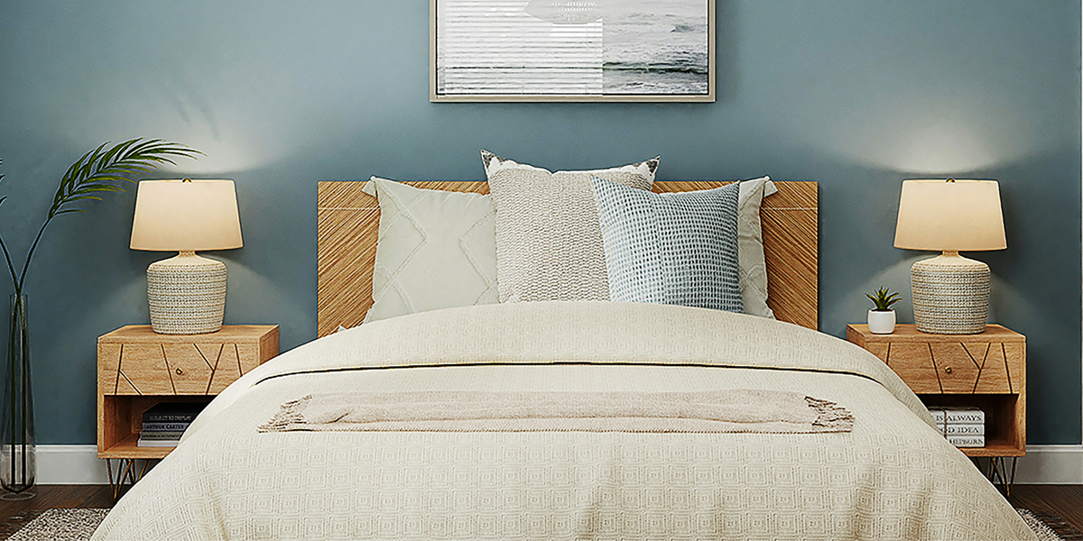 Bed in the Feng shui command position with nightstands on either side