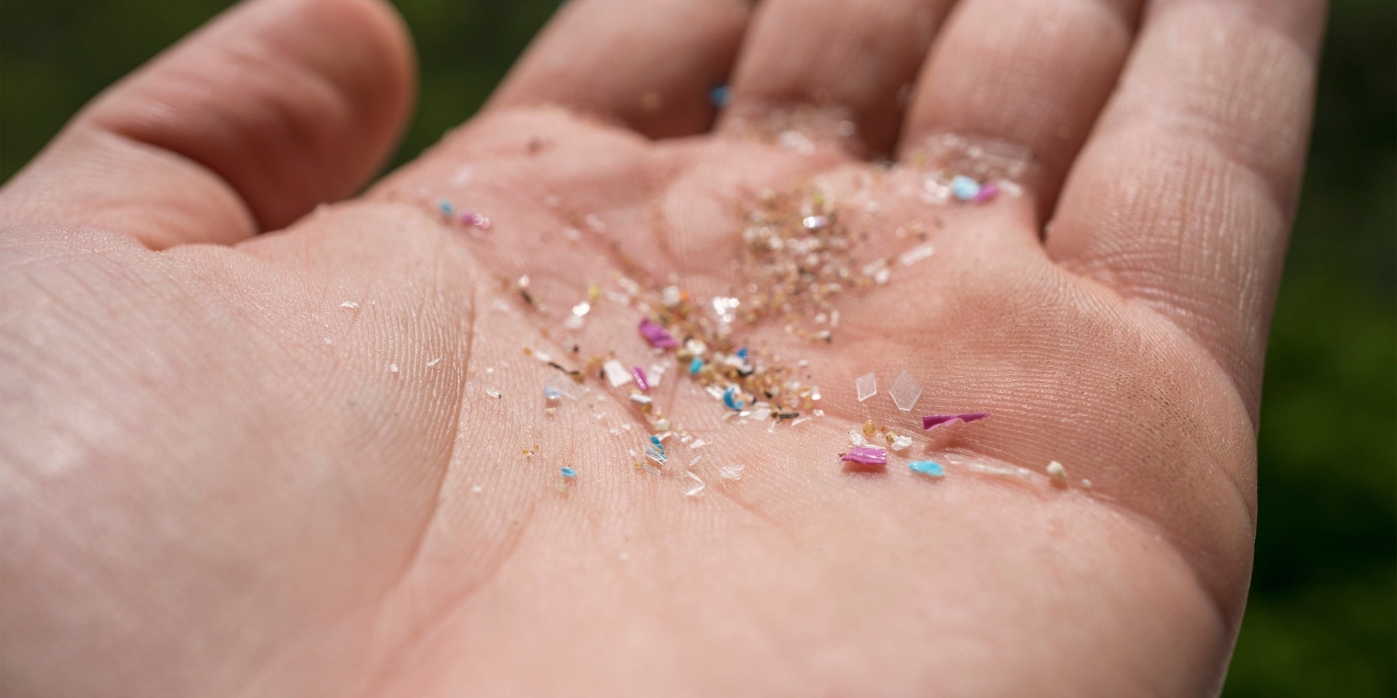 hand holding microplastics