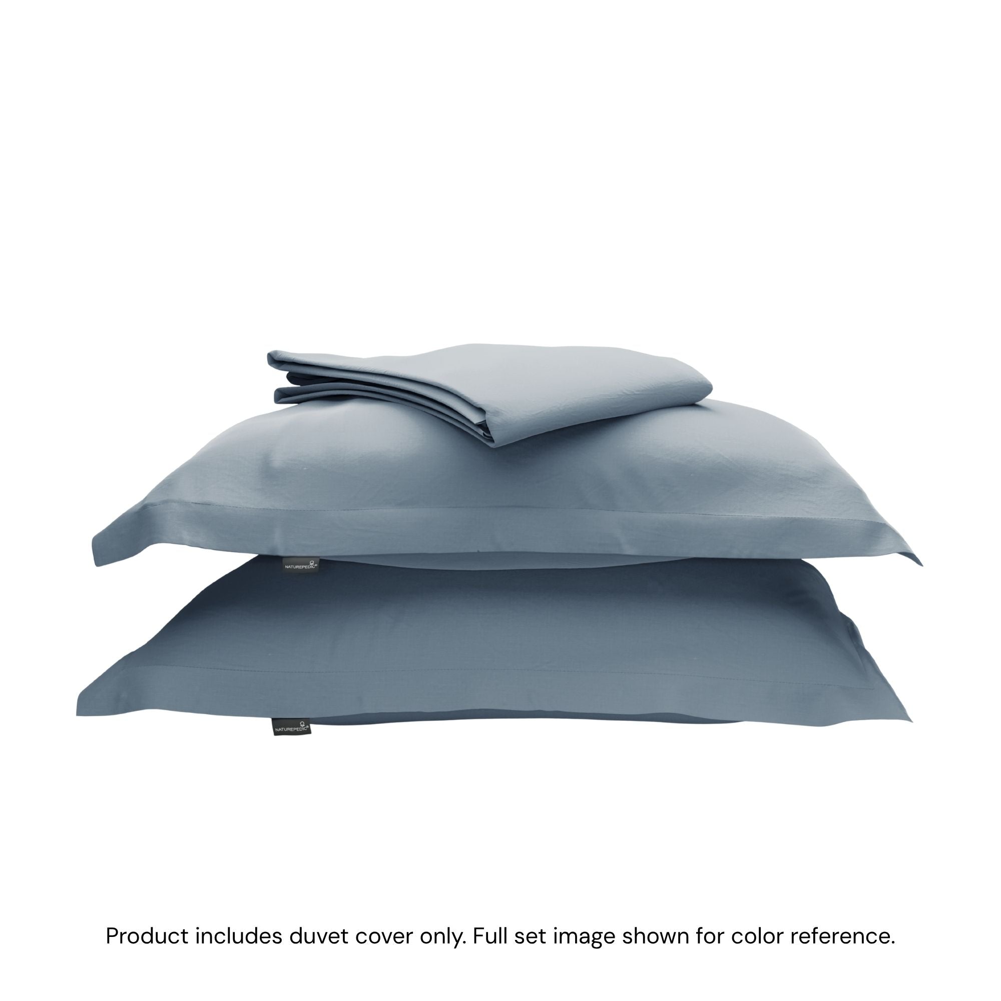 A folded duvet cover on top of two shams against a white background #color_mineral blue