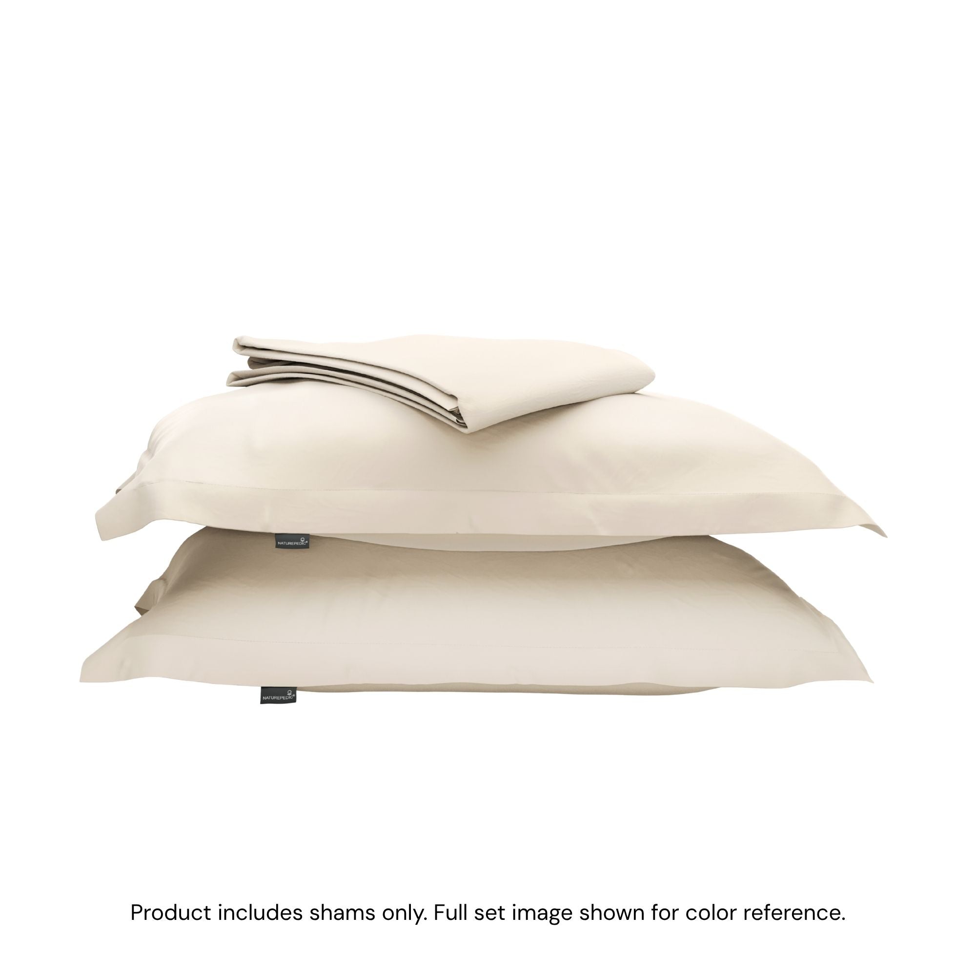 A duvet cover folded on top of two pillow shams #color_cream