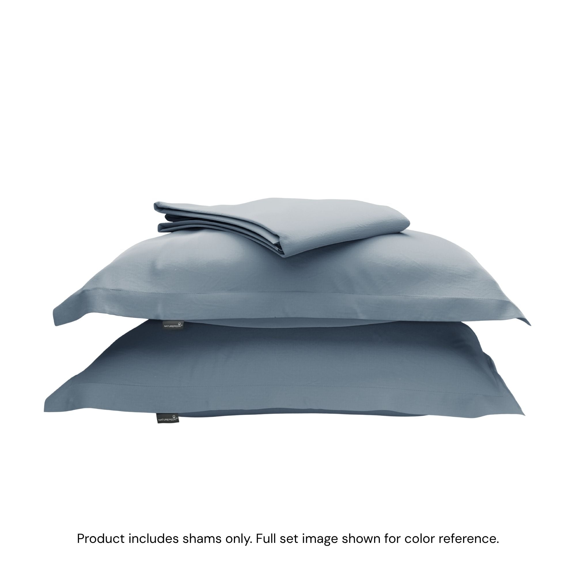 A duvet cover folded on top of two pillow shams #color_mineral blue