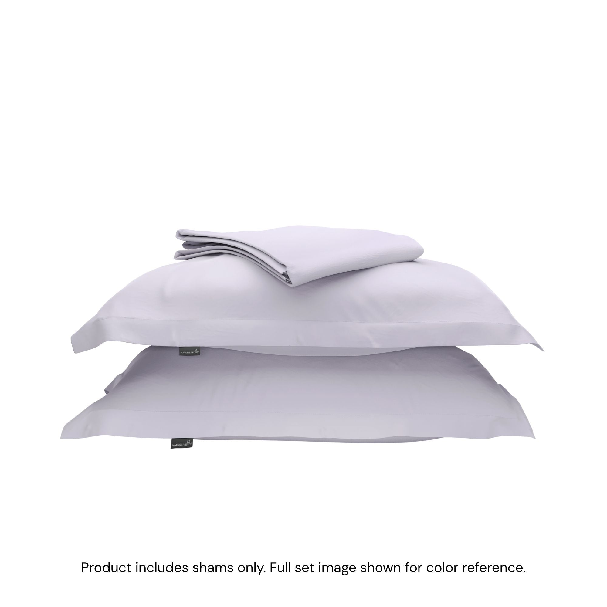A duvet cover folded on top of two pillow shams #color_wild bergamot