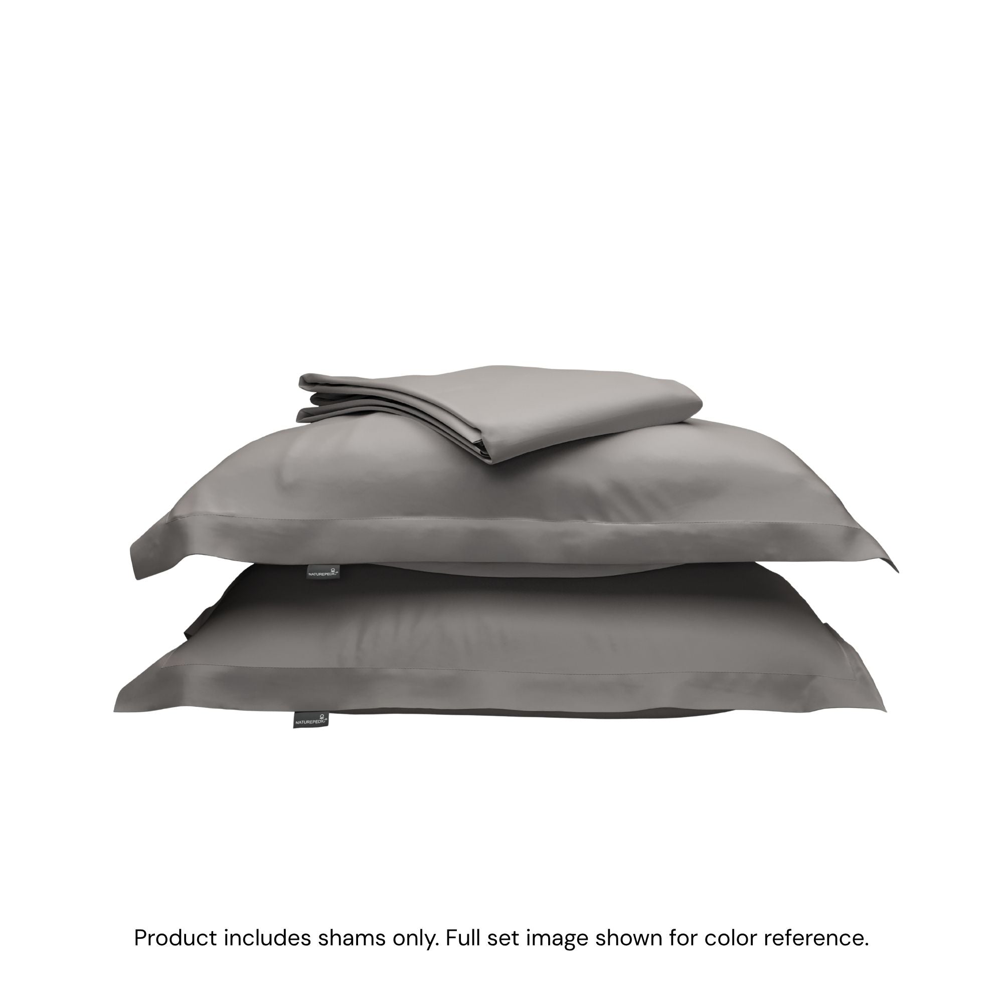 A folded duvet cover on top of two pillow shams. #color_pebble grey