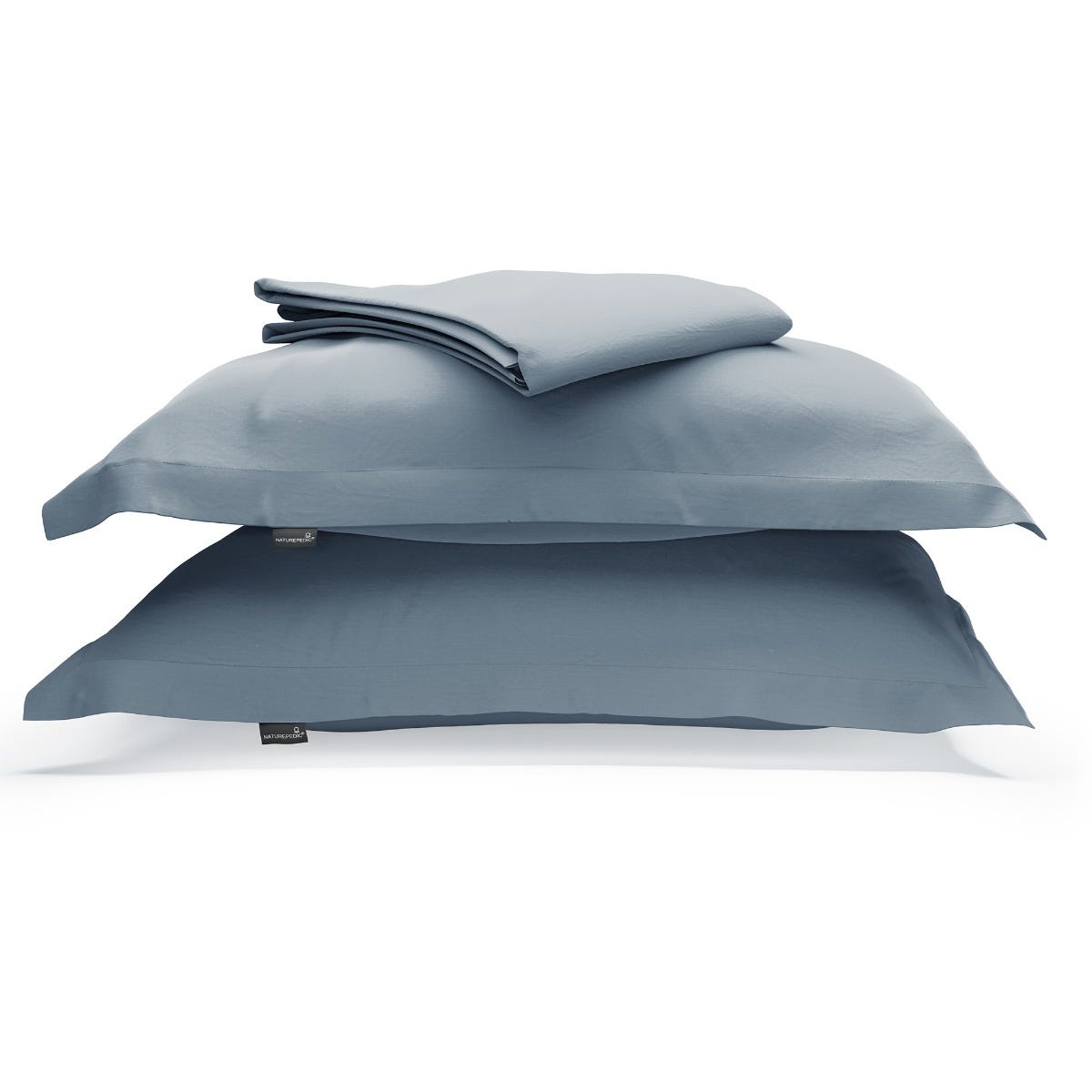 A duvet cover folded on top of two pillow shams against a white background #color_mineral- blue