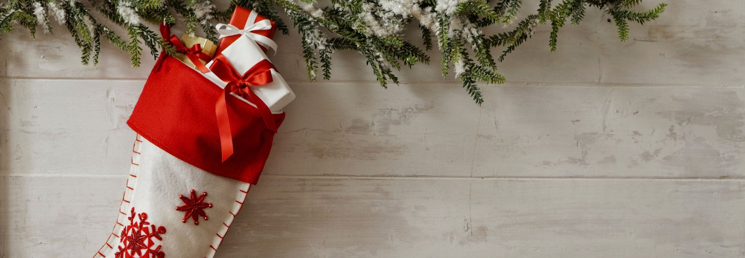 Woman admiring a holiday sticking in the store