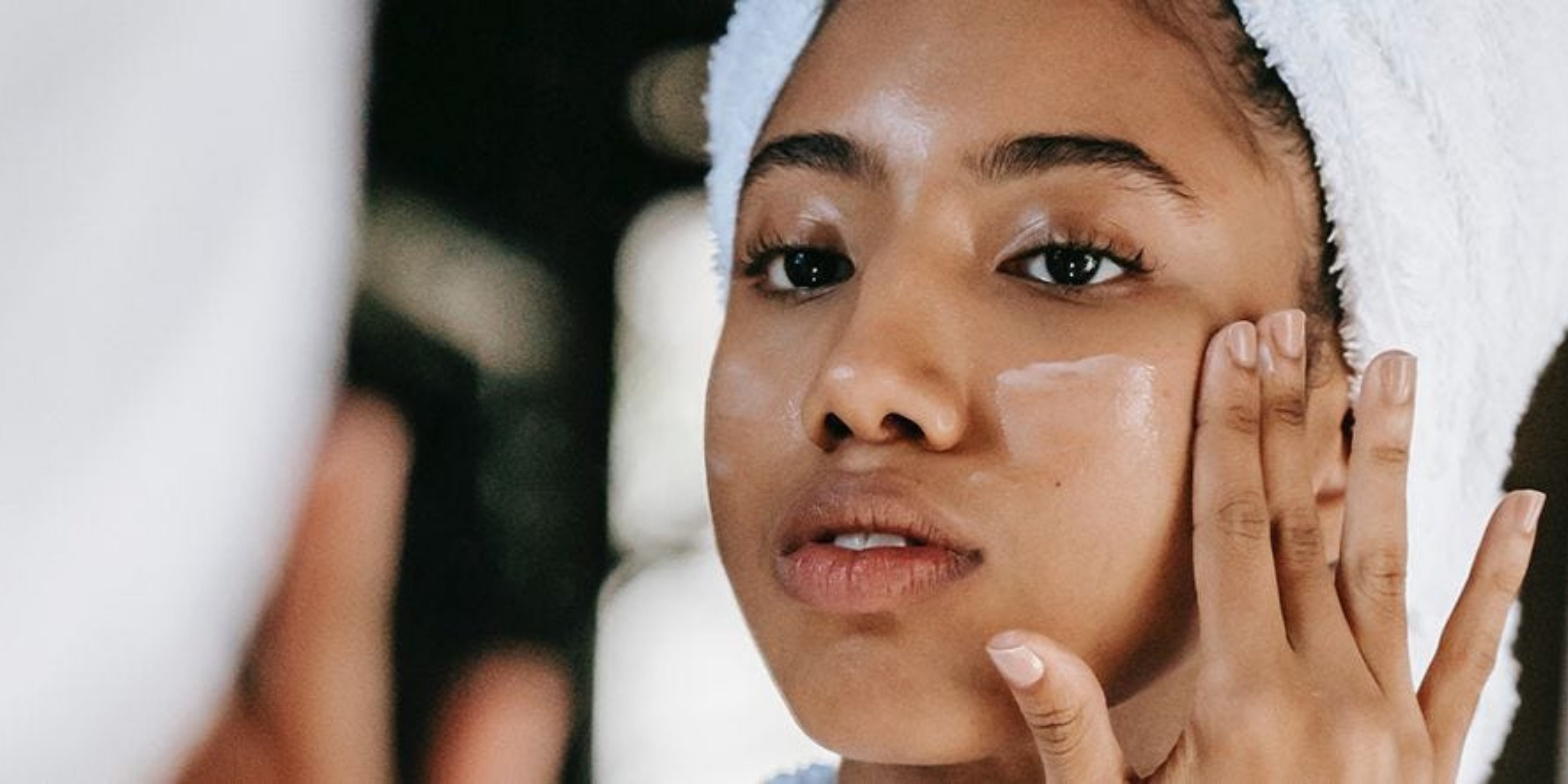 woman applying face cream