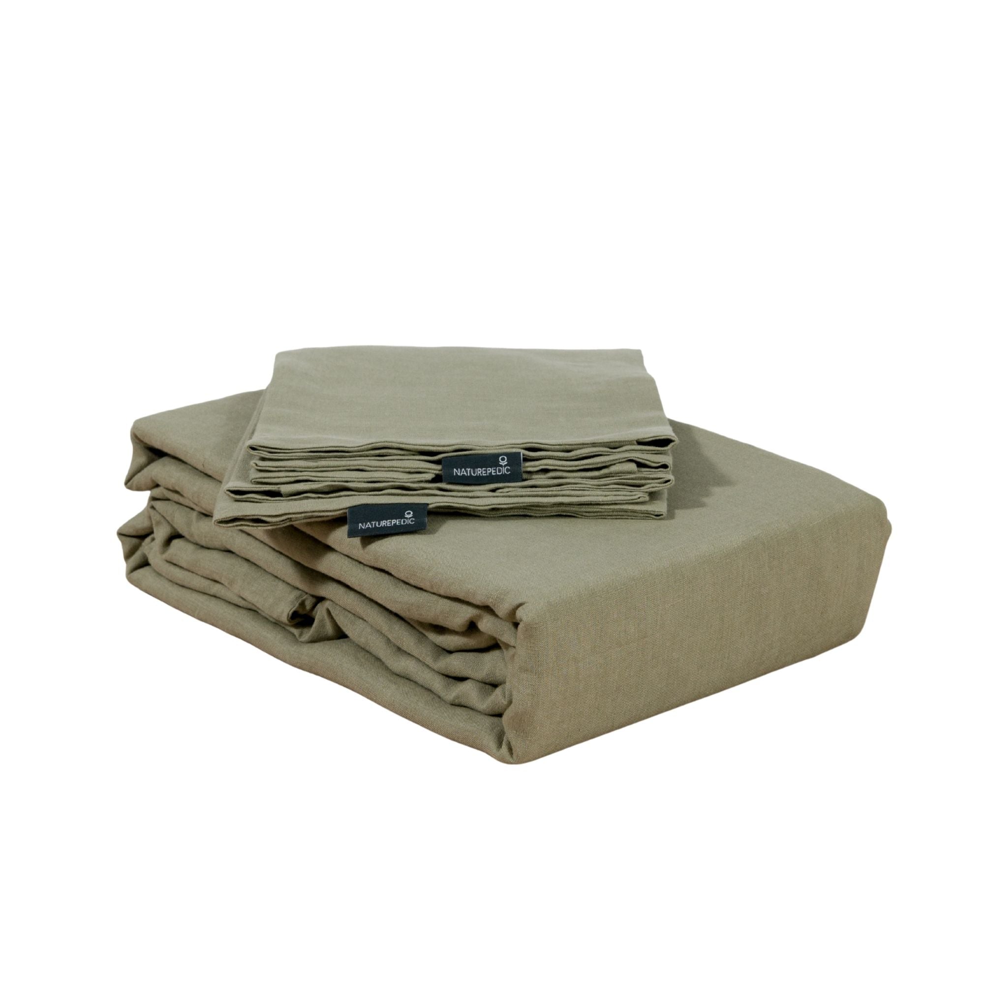Folded linen duvet cover and shams against a white background #color_forest canopy