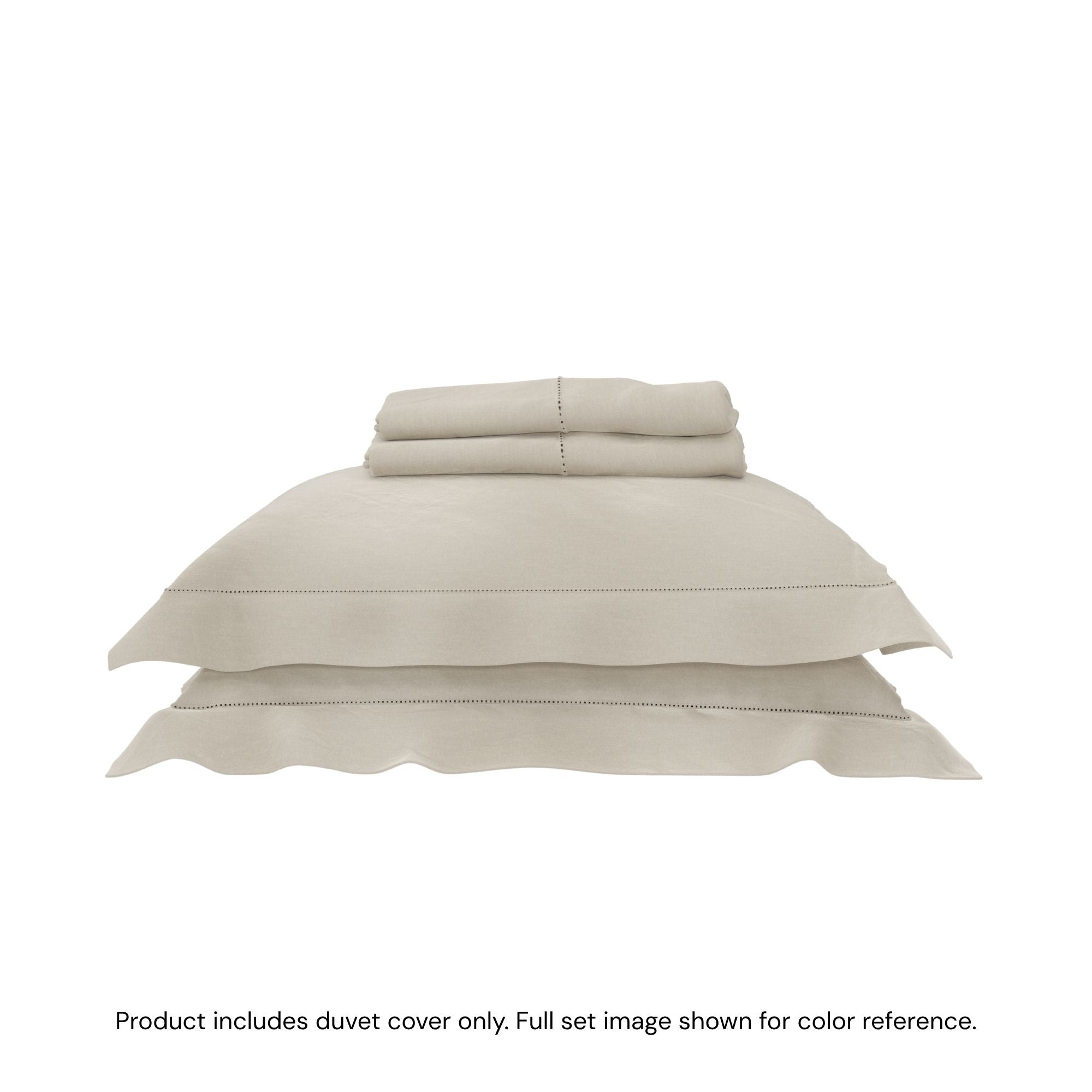 A duvet cover folded on top of two pillow shams #color_undyed
