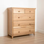 A light oak wood chest of drawers with five drawers, two small on top and three larger on the bottom #color_natural