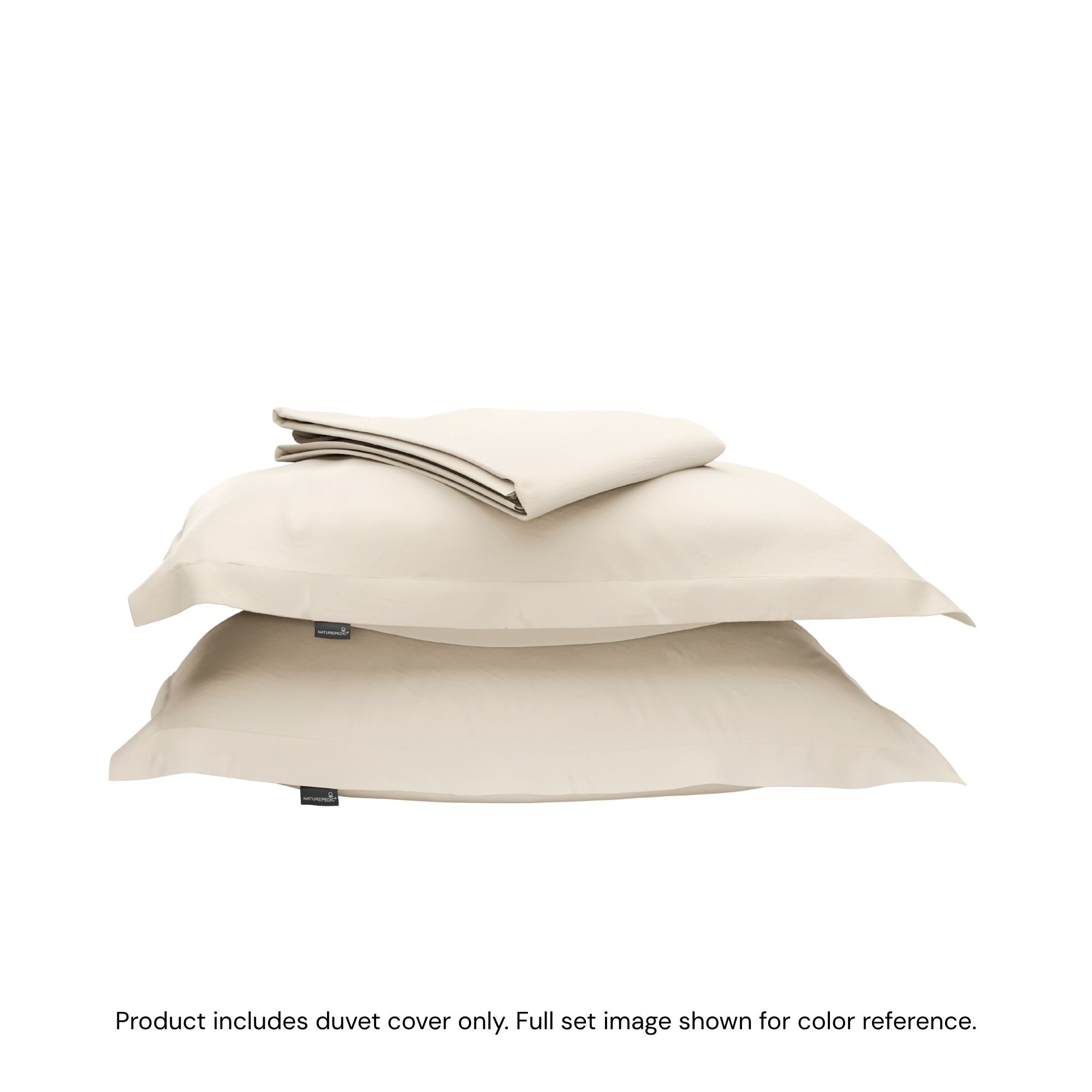 A folded duvet cover on top of two shams against a white background #color_undyed