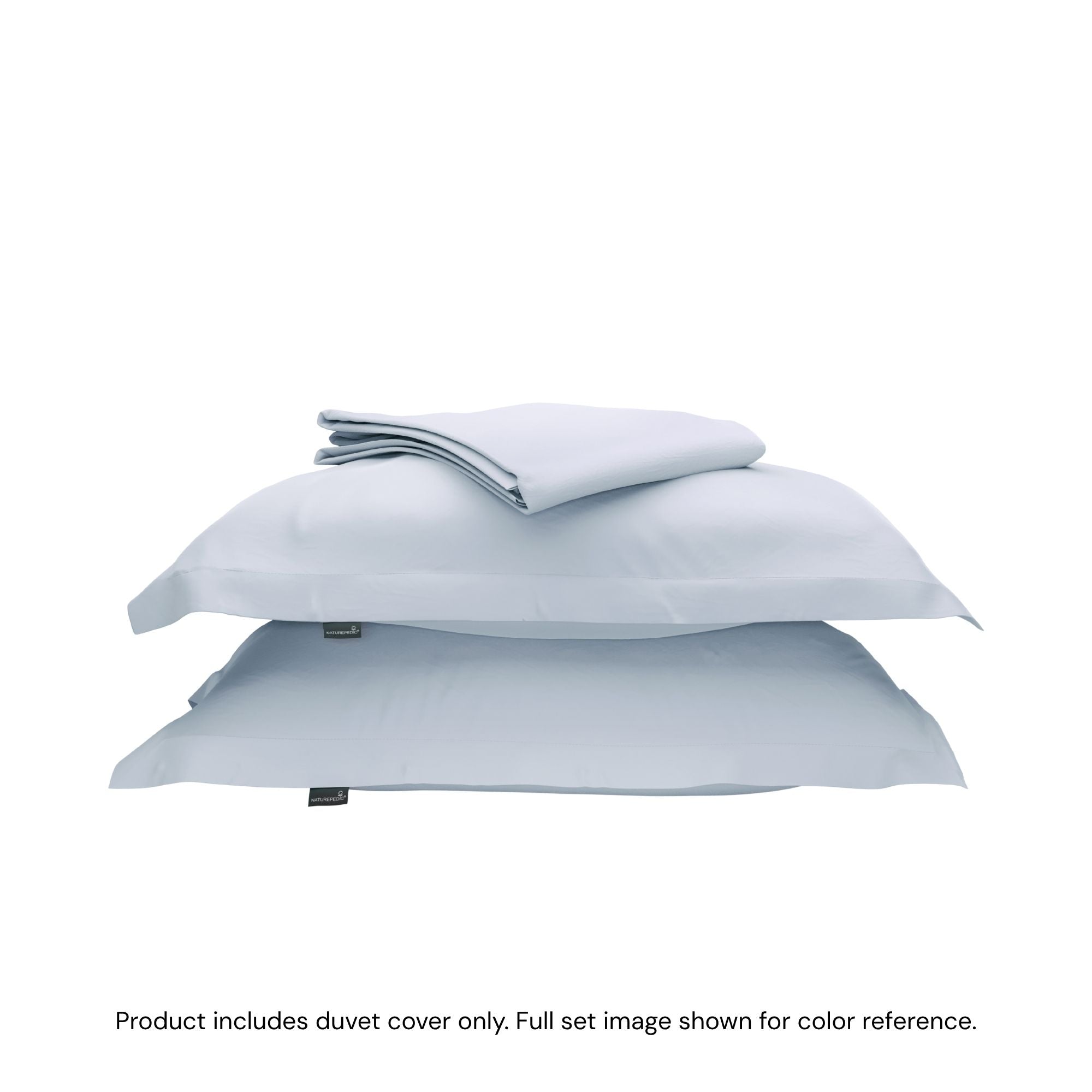 A folded duvet cover on top of two shams against a white background #color_washed cornflower