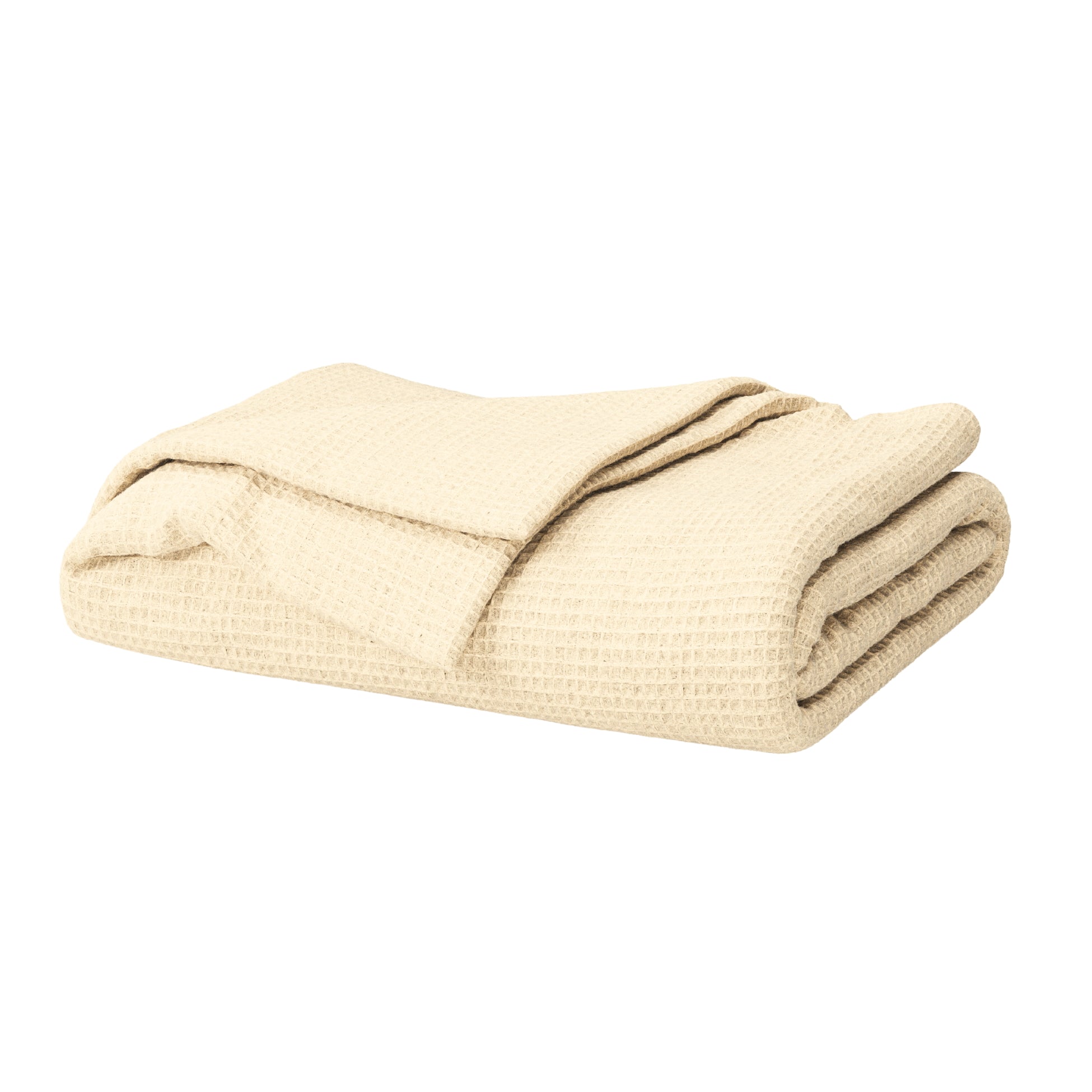 A folded waffle-weave blanket on a solid white background. #color_buttercream