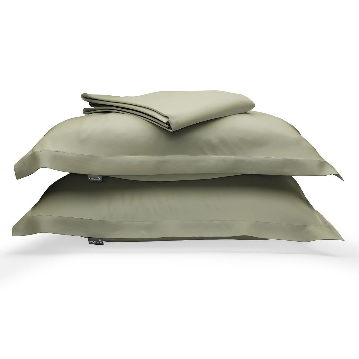 Green duvet cover folded on top of two matching shams against a white background #color_forest canopy