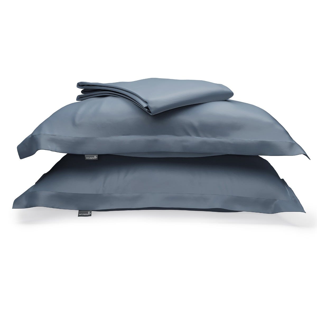 Mineral Blue duvet cover folded on top of two matching shams against a white background #color_mineral blue
