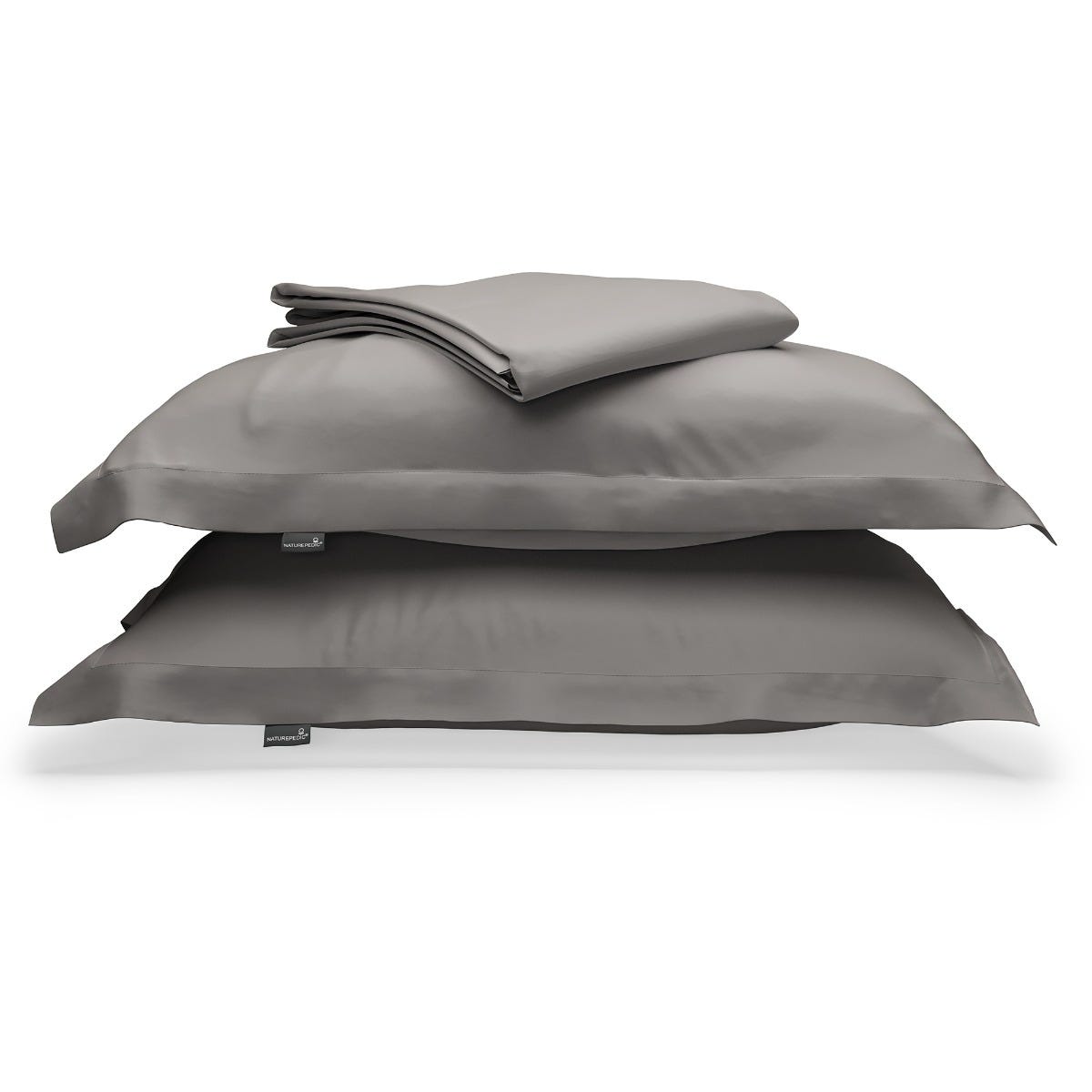 Dark grey duvet cover folded on top of two matching shams against a white background #color_pebble grey