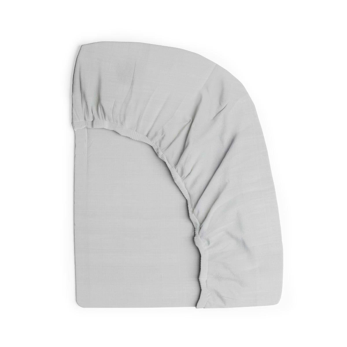 Fitted sheet folded against a white background #color_mist