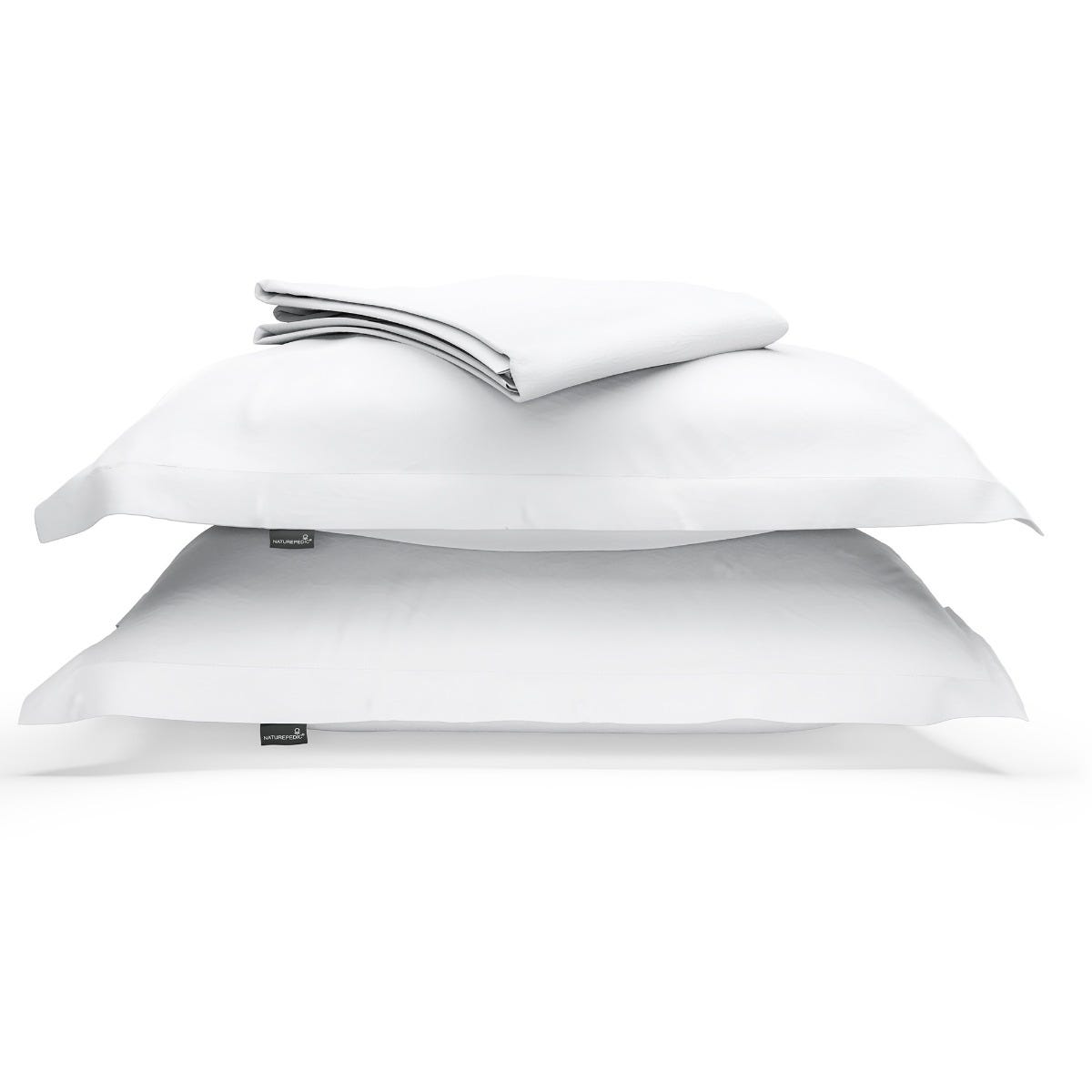 A duvet cover folded on top of two pillow shams against a white background #color_arctic snow
