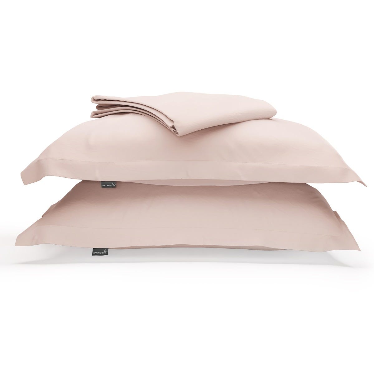 A duvet cover folded on top of two pillow shams against a white background #color_petal