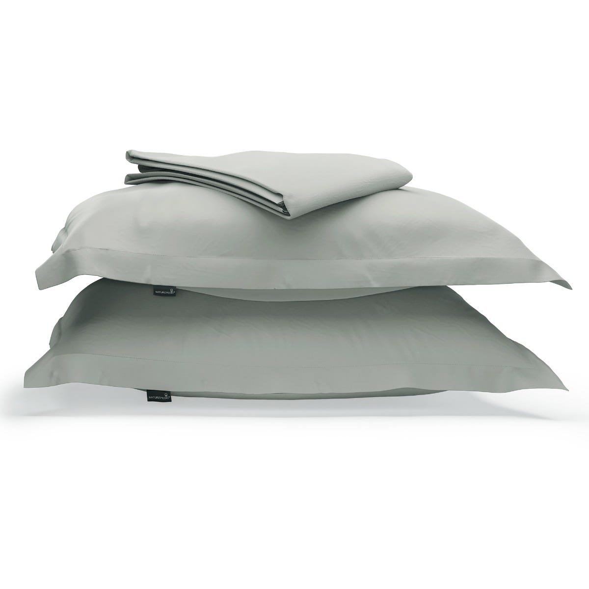 A duvet cover folded on top of two pillow shams against a white background #color_sage
